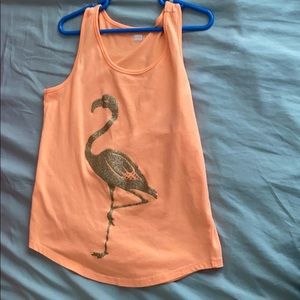 Peach tank top.